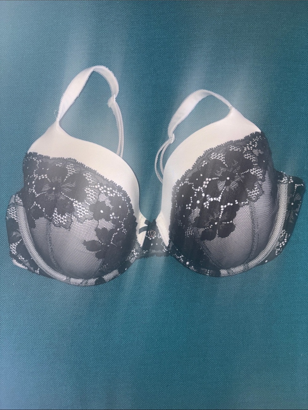 White with black lace trim body by Victoria perfect coverage bra